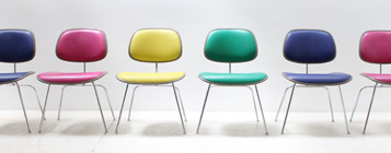 A SET OF COLORFUL SOFT DCM CHAIRS