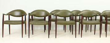 SET OF TWELVE LEATHER ARMCHAIRS BY JUAN GAMBOA