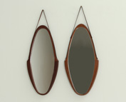 A PAIR OF ITALIAN TEAK MIRRORS, 1960s